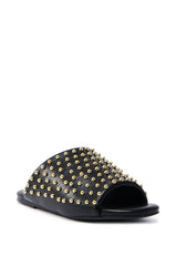 AKIRA BAGGER STUDDED SLIP ON SANDAL IN BLACK