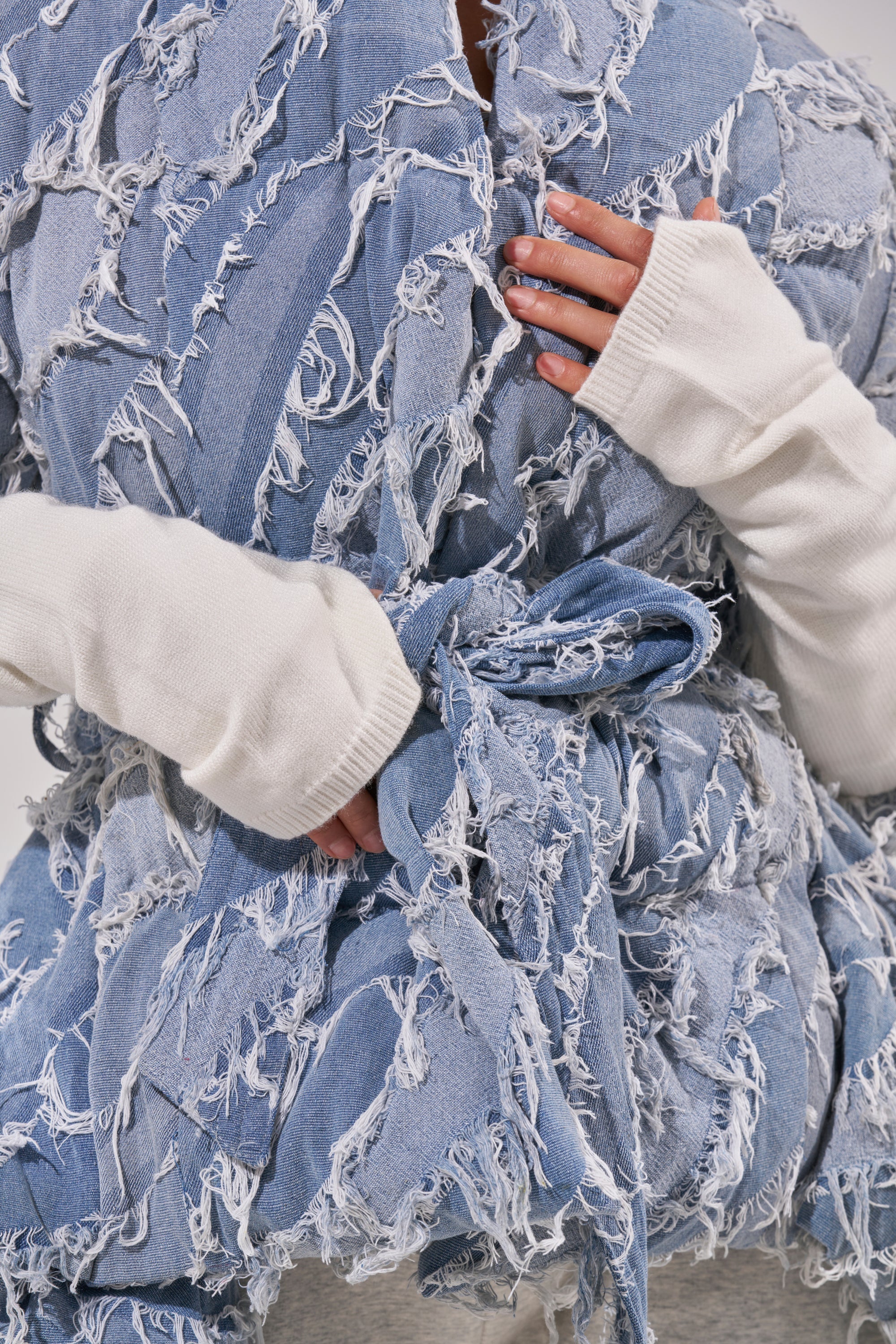 RIB SLEEVE PEPLUM PUFFER IN DENIM