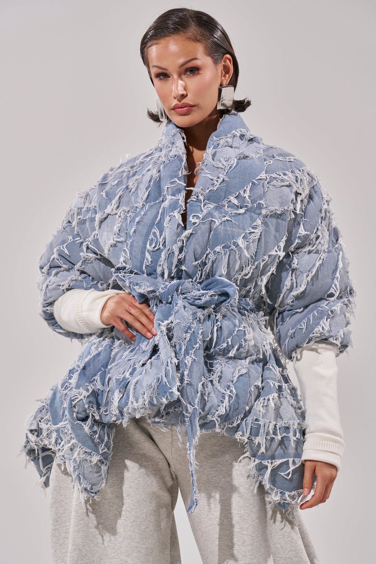 RIB SLEEVE PEPLUM PUFFER IN DENIM