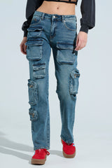 ALL OVER POCKET DETAIL RELAXED FIT JEANS IN MEDIUM BLUE DENIM