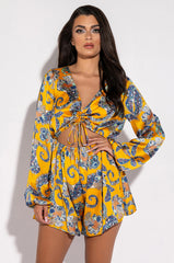 ADMIT IT LONG SLEEVE PRINTED ROMPER WITH CUT OUT