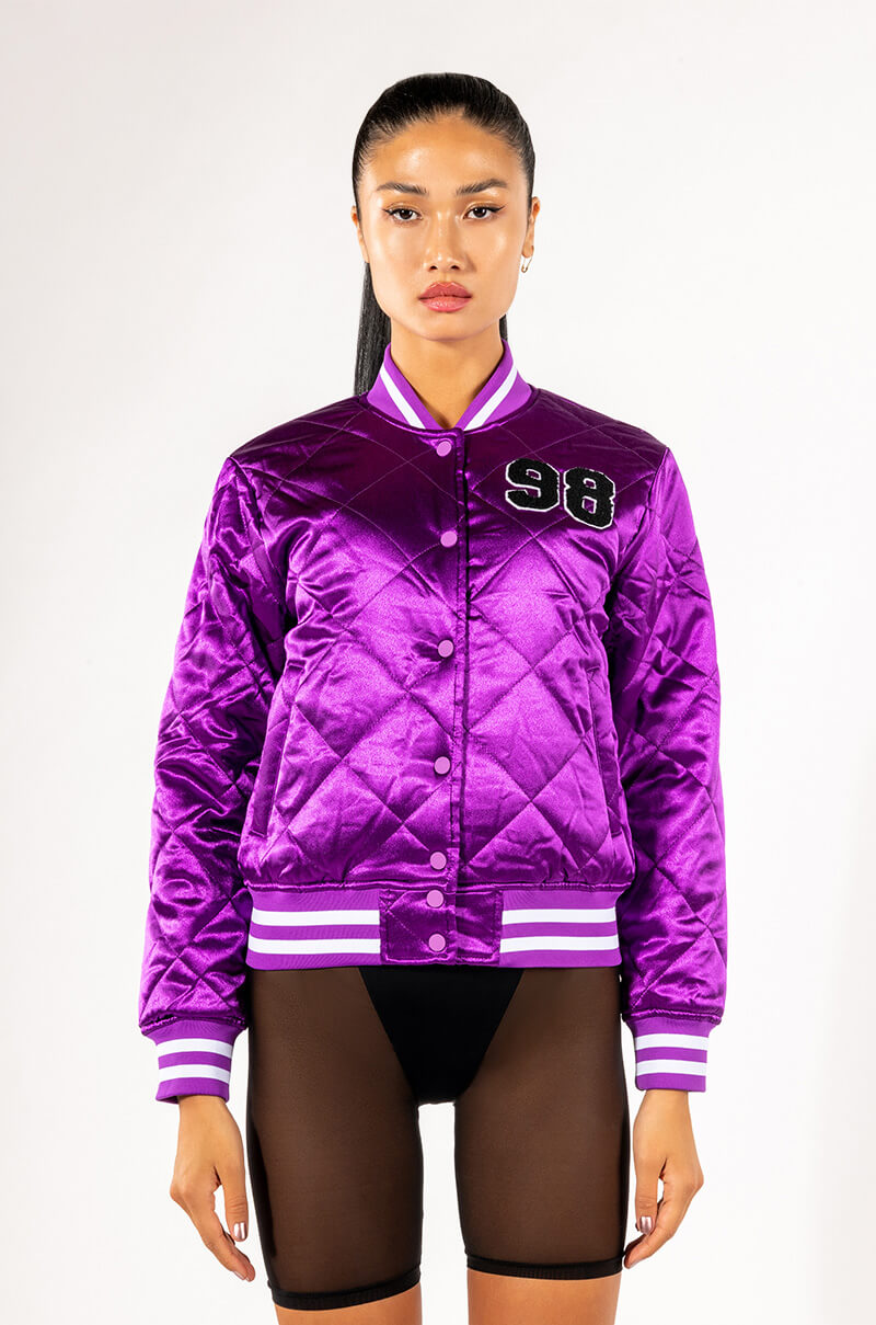WE CALL HER PURP VARSITY BOMBER