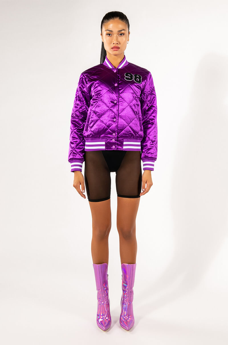 WE CALL HER PURP VARSITY BOMBER