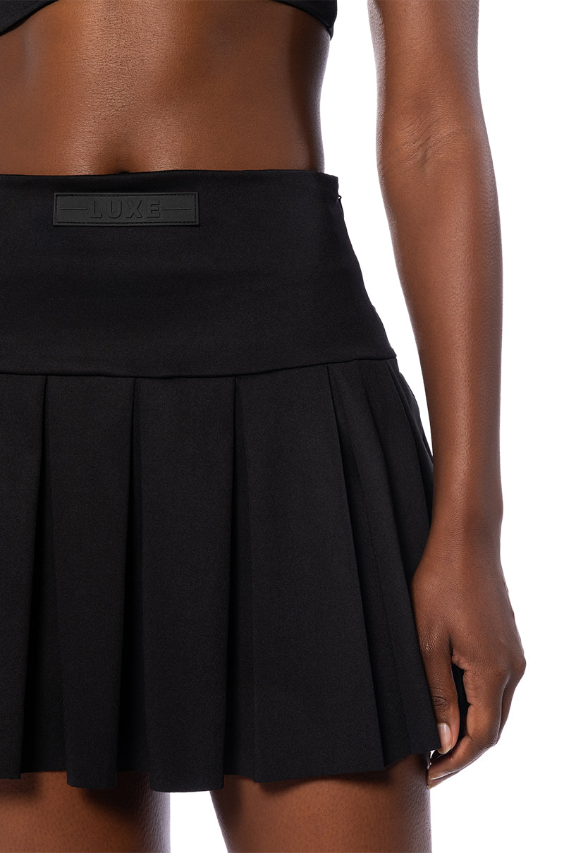 ITS THE PAXTON LUXE PLEATED SKORT IN BLACK