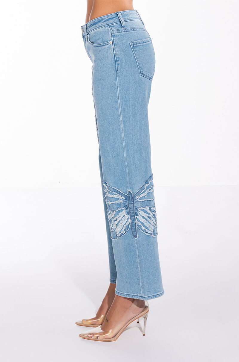 INFINITY BUTTERFLY DETAIL MID RISE WIDE LEG DENIM