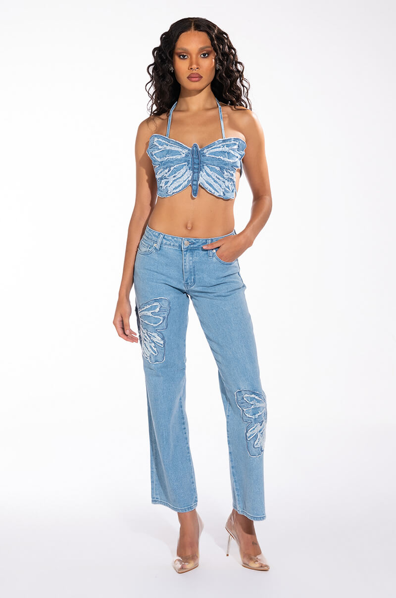 INFINITY BUTTERFLY DETAIL MID RISE WIDE LEG DENIM