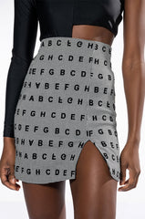 READ BETWEEN THE LINES HIGH RISE MINI SKIRT